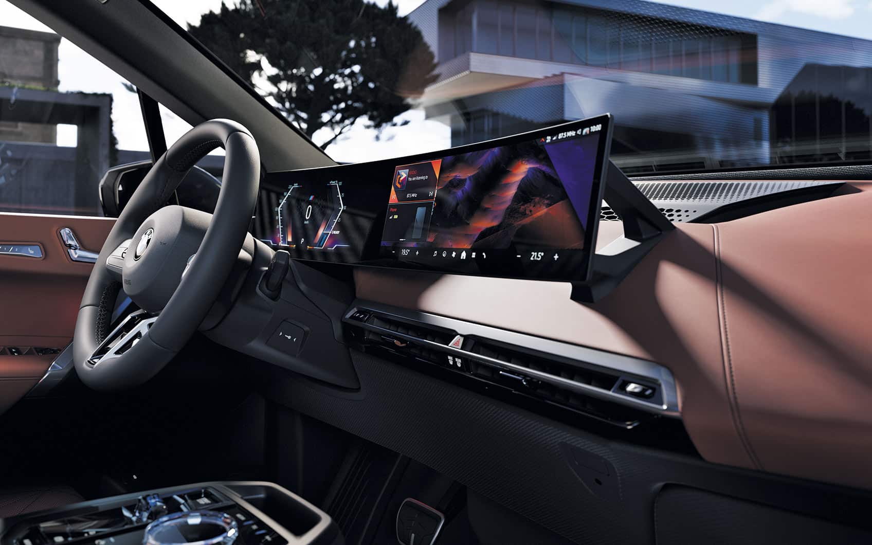 Detailaufnahme des Cockpit eines BMW iX mit Fokus auf das BMW Curved Display